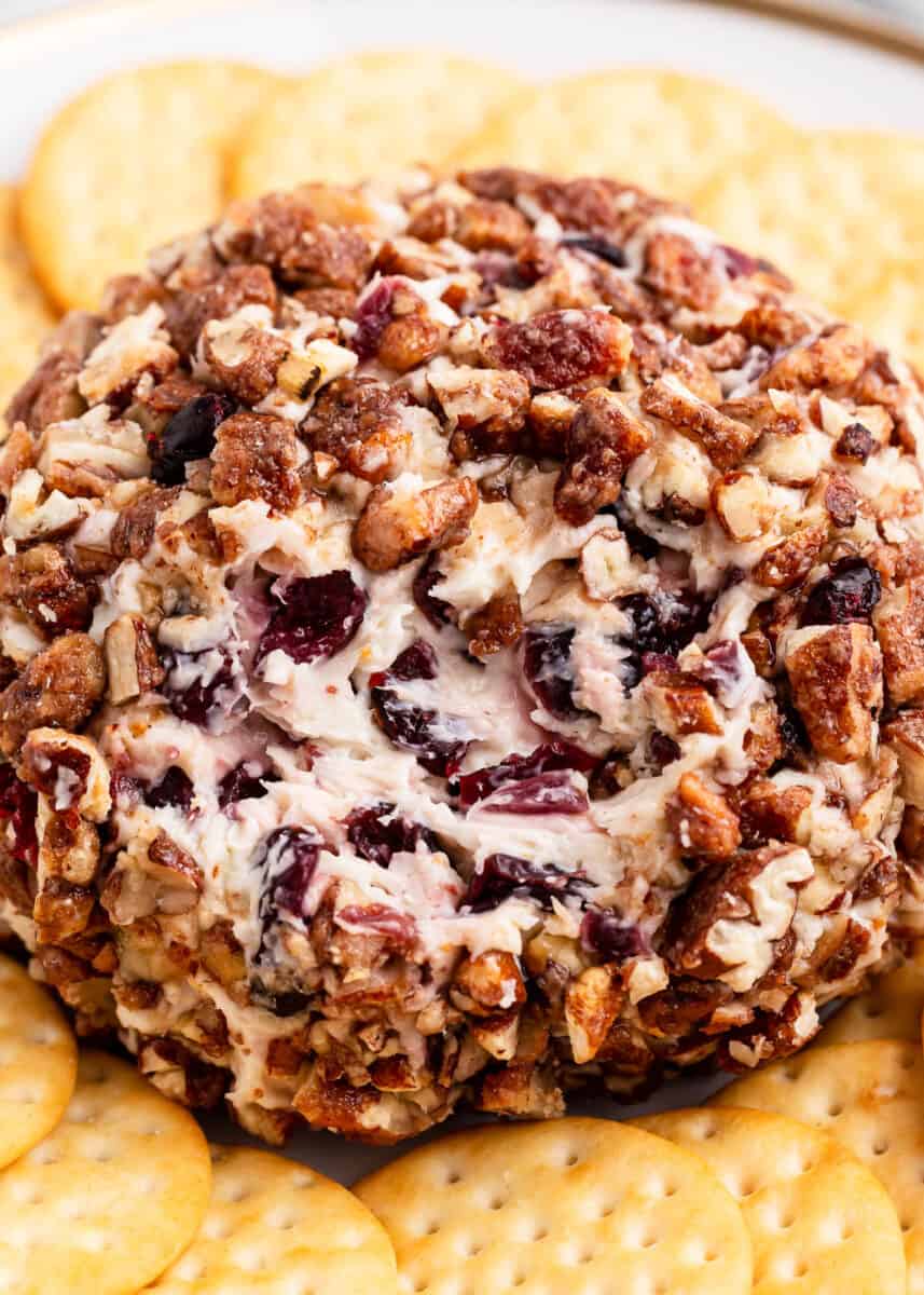 cranberry cheese ball with pecans and crackers