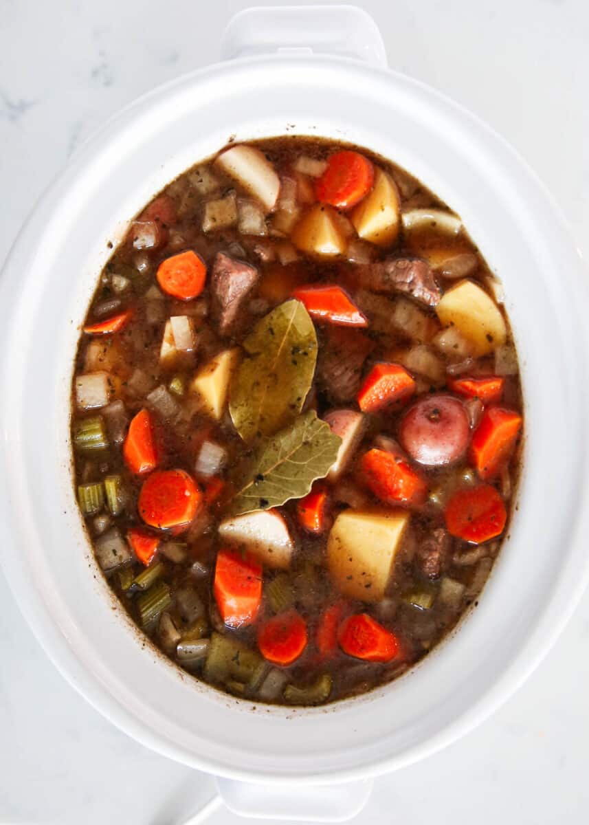 beef stew in white crockpot