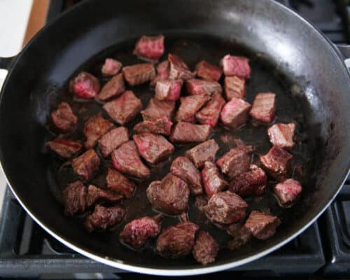 cooking beef in skillet