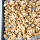 caramel corn on baking sheet