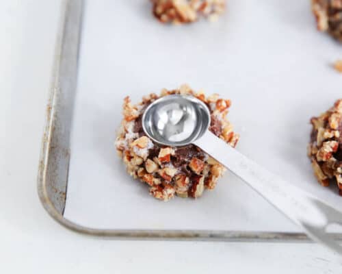 pressing spoon into chocolate cookie