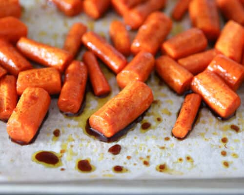 carrots and balsamic oil on pan