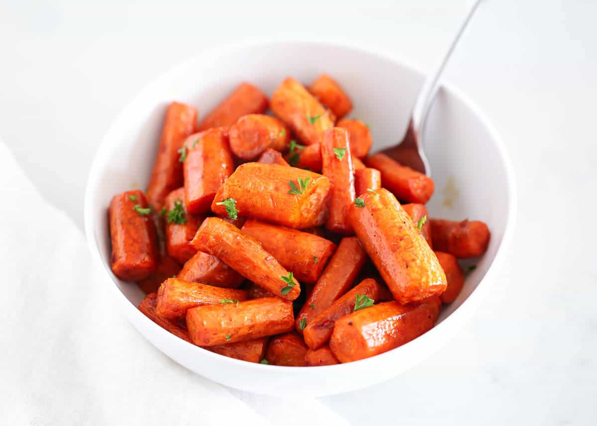 roasted carrots in white bowl