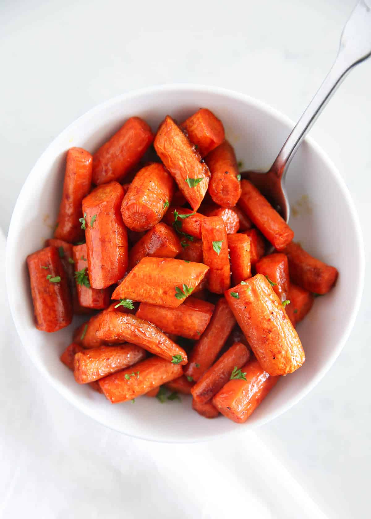 roasted balsamic carrots in white bowl