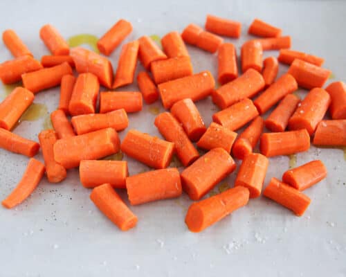 sliced carrots on baking sheet