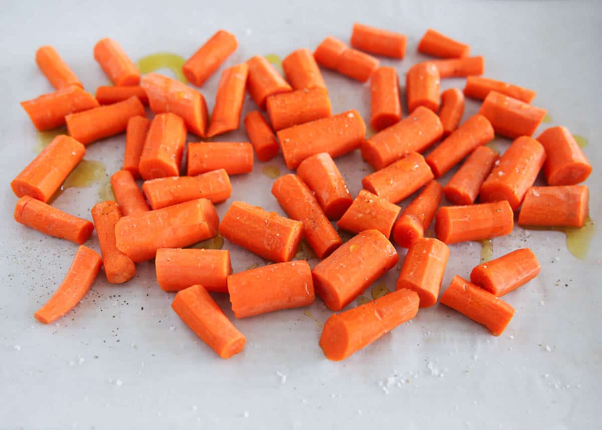sliced carrots on baking sheet