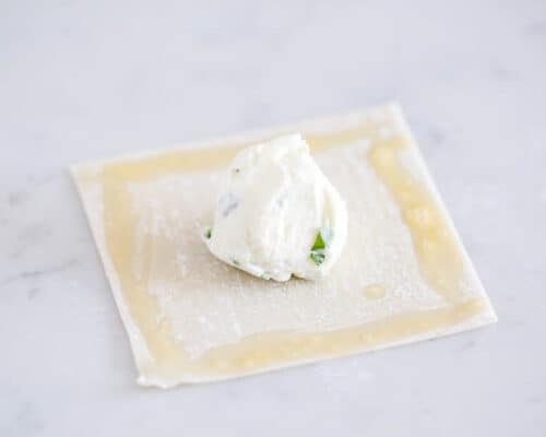 cream cheese on top of wonton wrapper