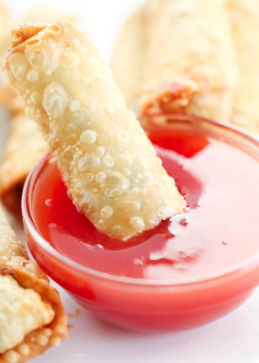 egg roll dipped in sweet and sour sauce