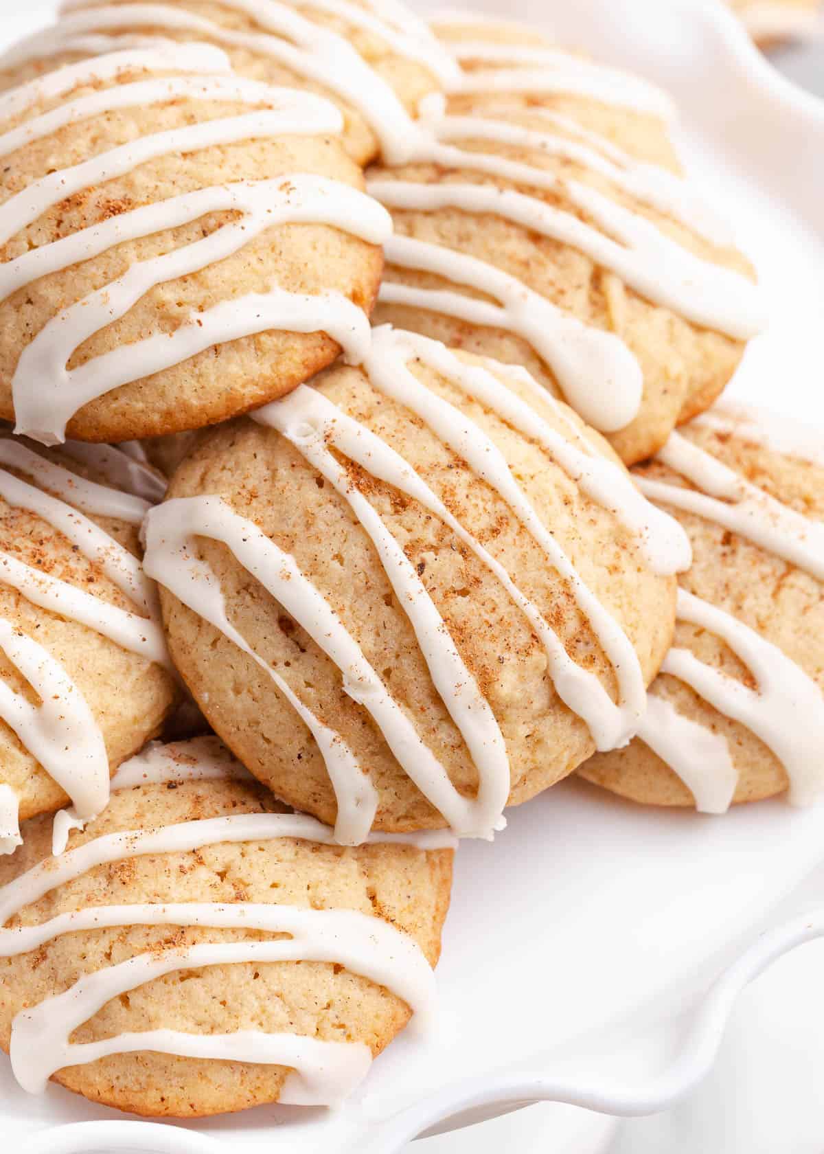 Eggnog cookies on white plate.