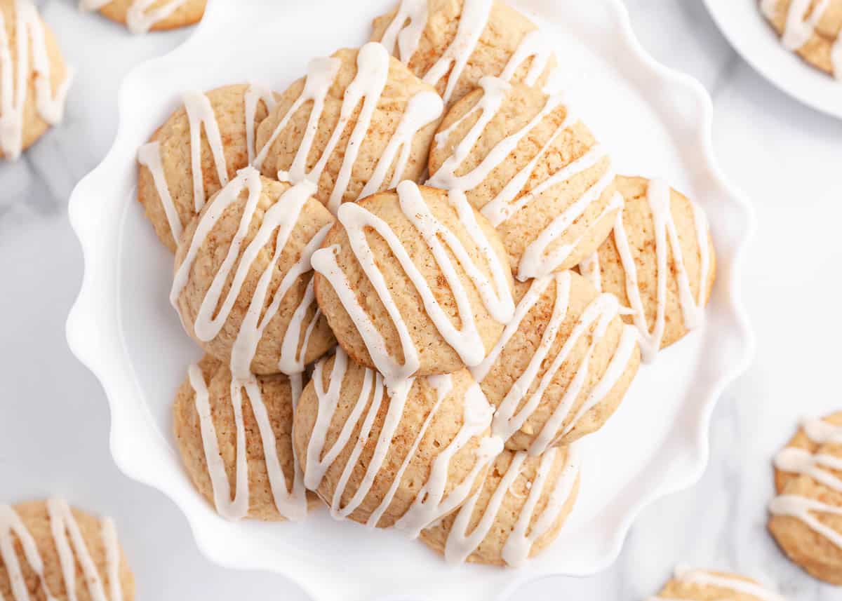 Eggnog cookies on white plate.