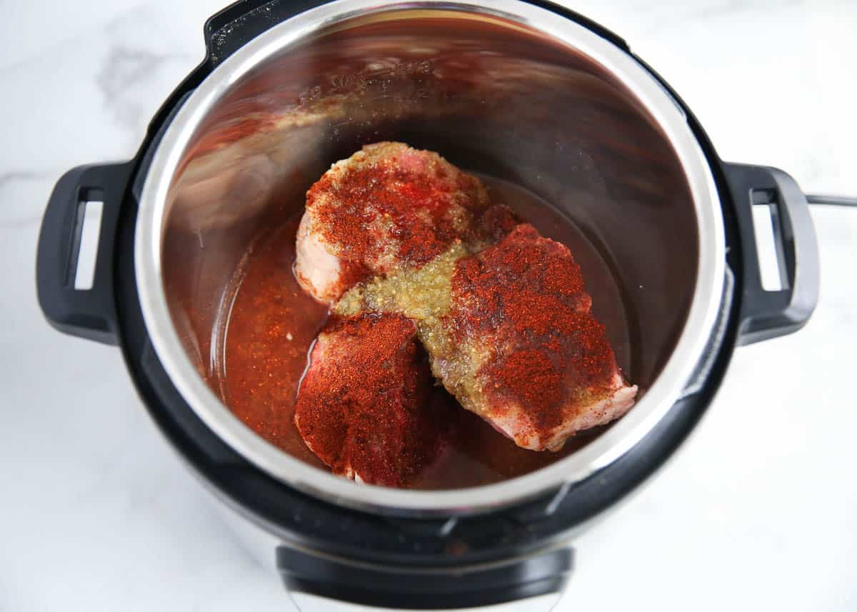 beef and seasonings in instant pot