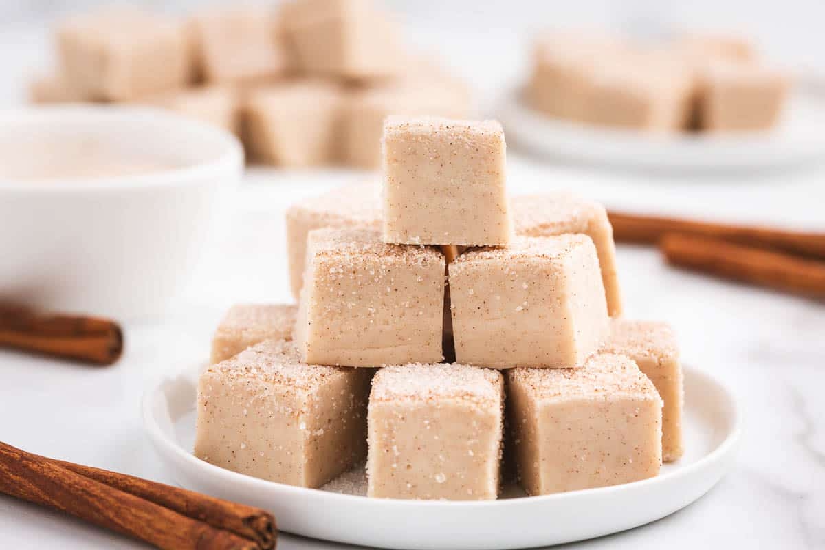 snickerdoodle fudge stacked on white plate