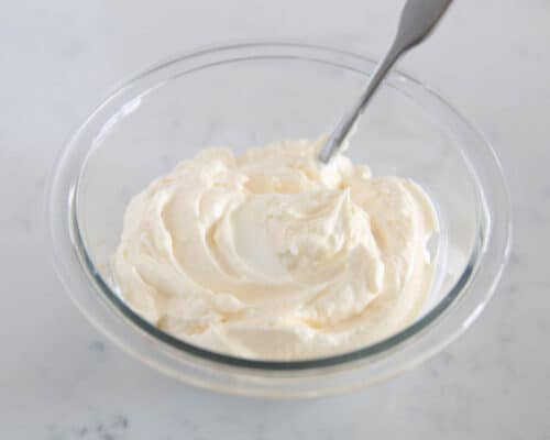 mixing mayo in glass bowl