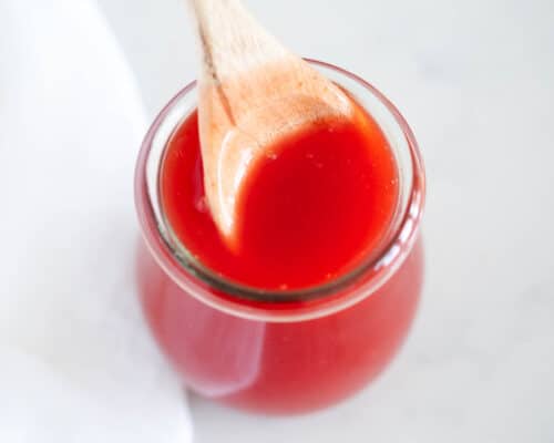 sweet and sour sauce in glass bowl