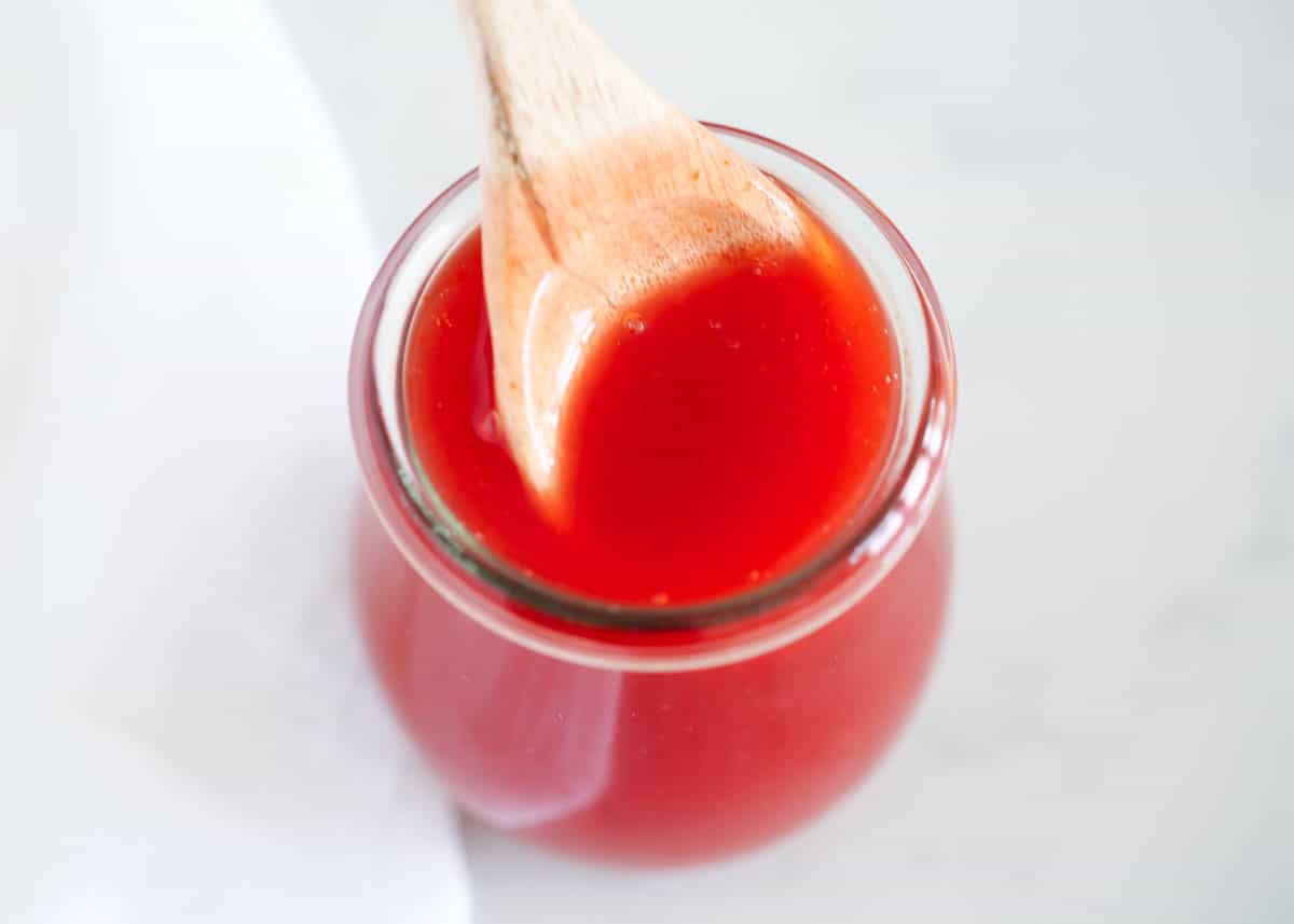 sweet and sour sauce in glass bowl