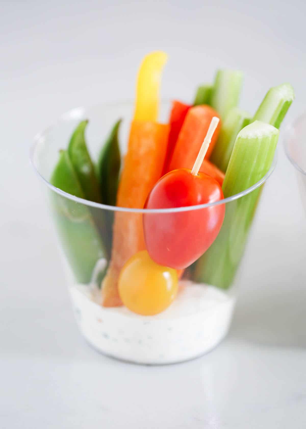 vegetables in cup with dip