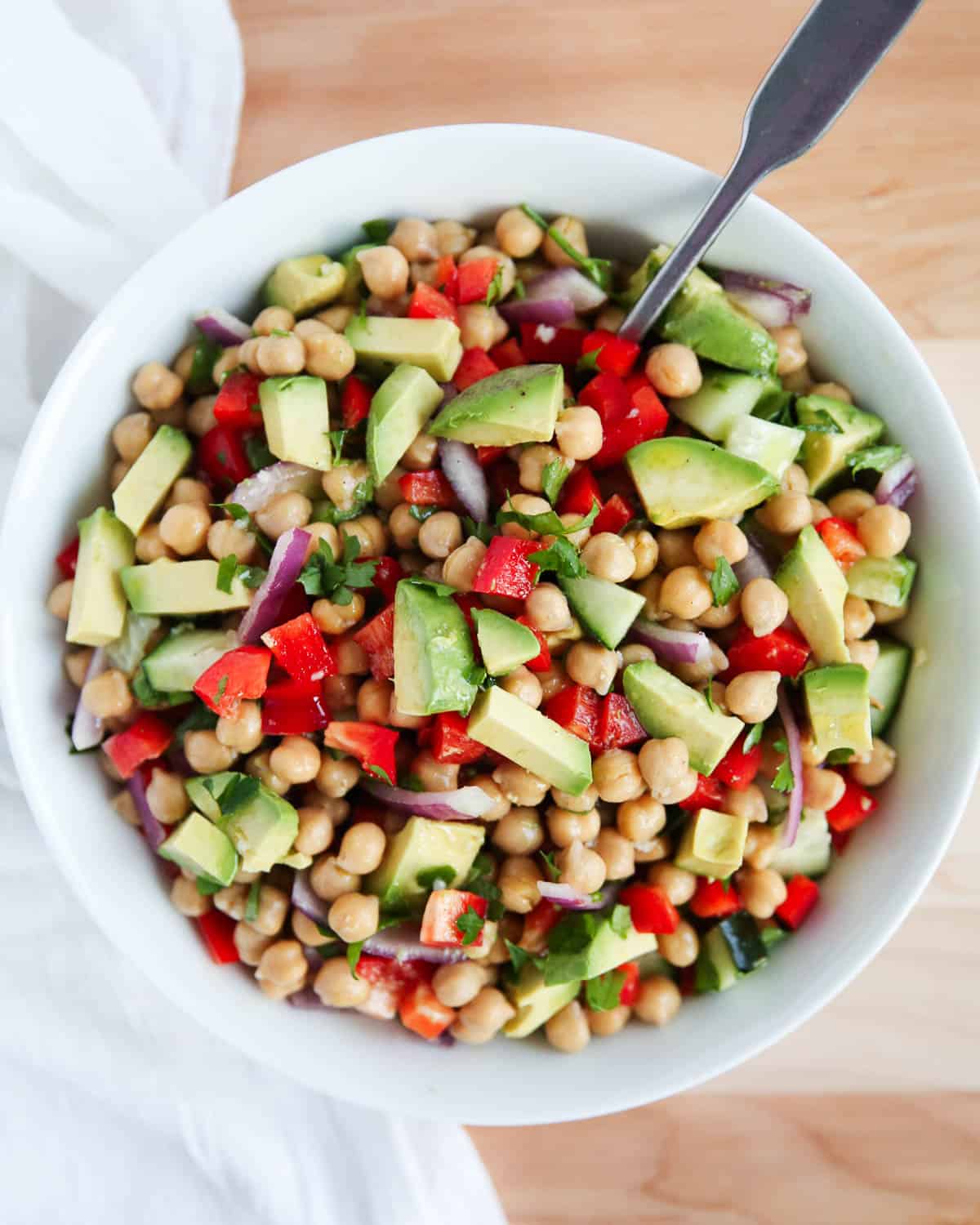 chickpea salad in white bowl