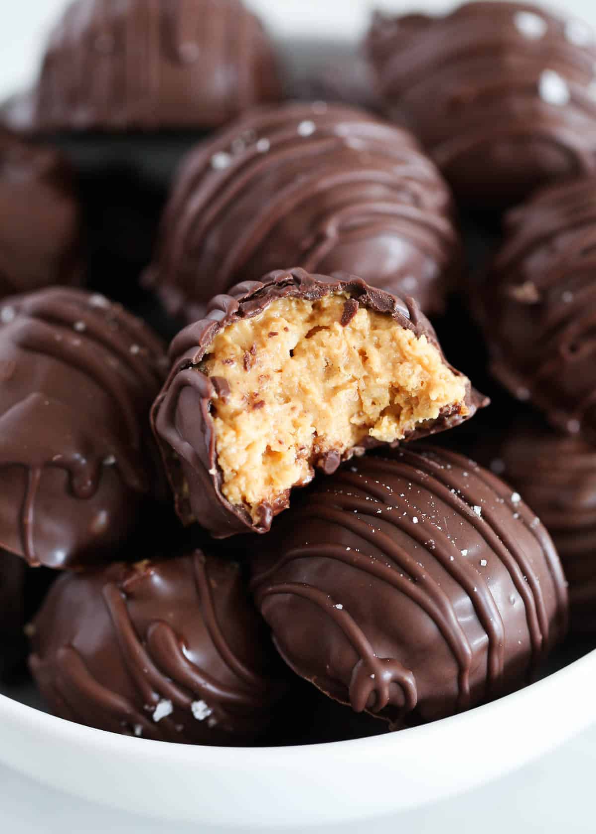 peanut butter ball with rice krispies in bowl