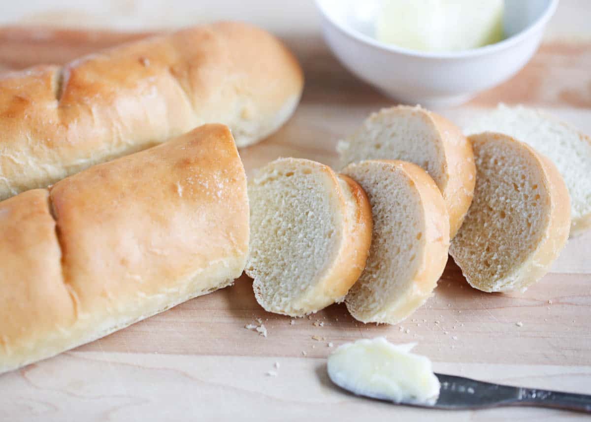 sliced french bread on cutting board