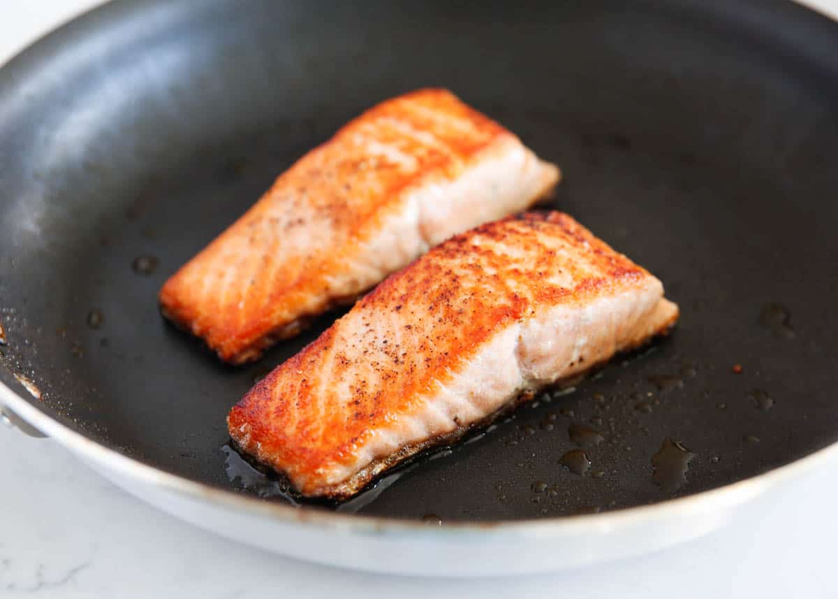 cooked salmon in skillet