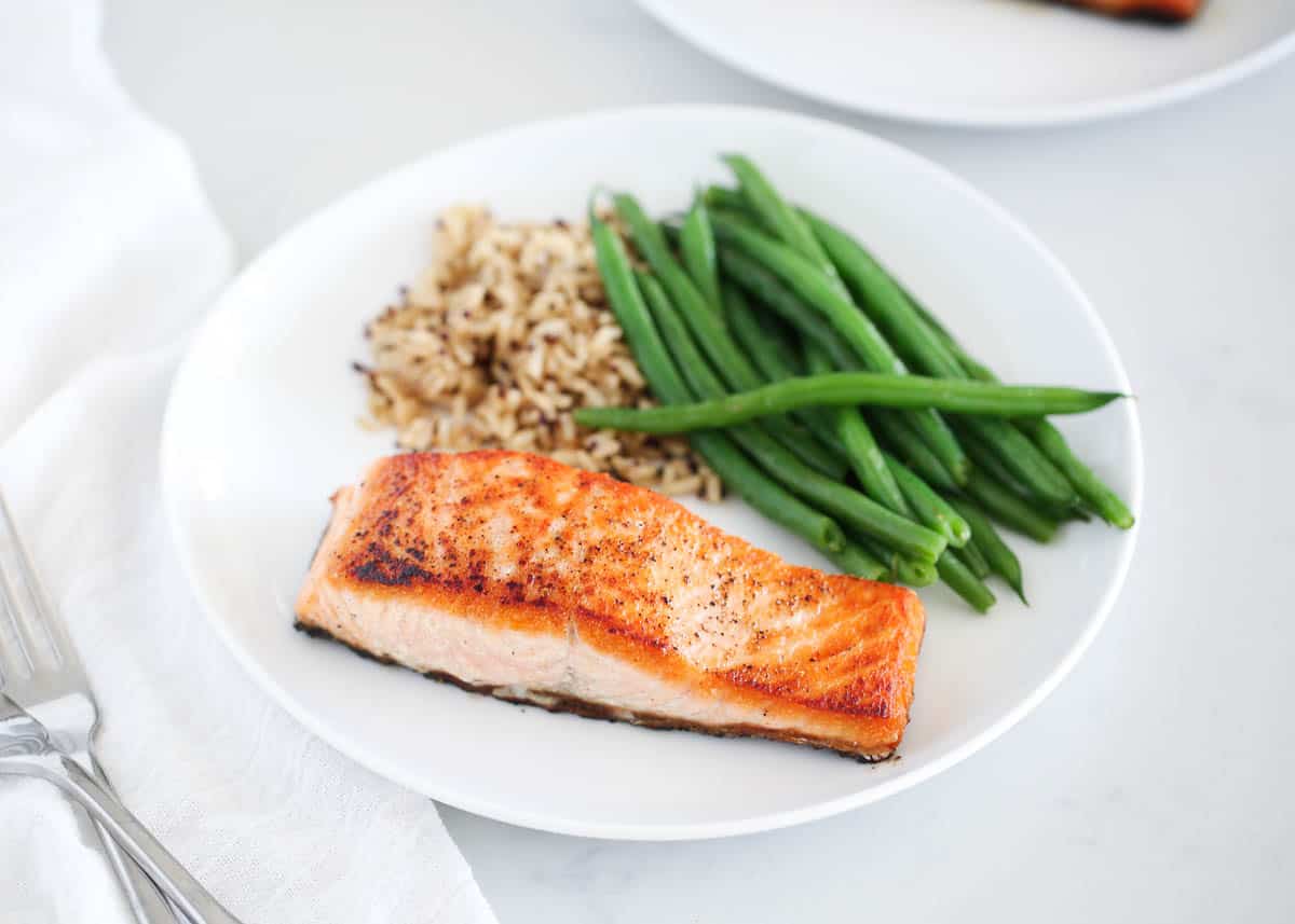 salmon and green beans on plate