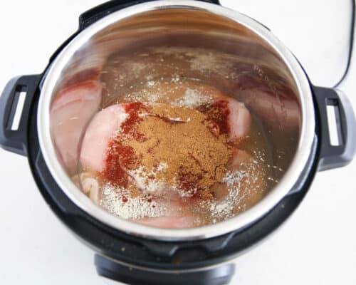chicken and seasonings in instant pot