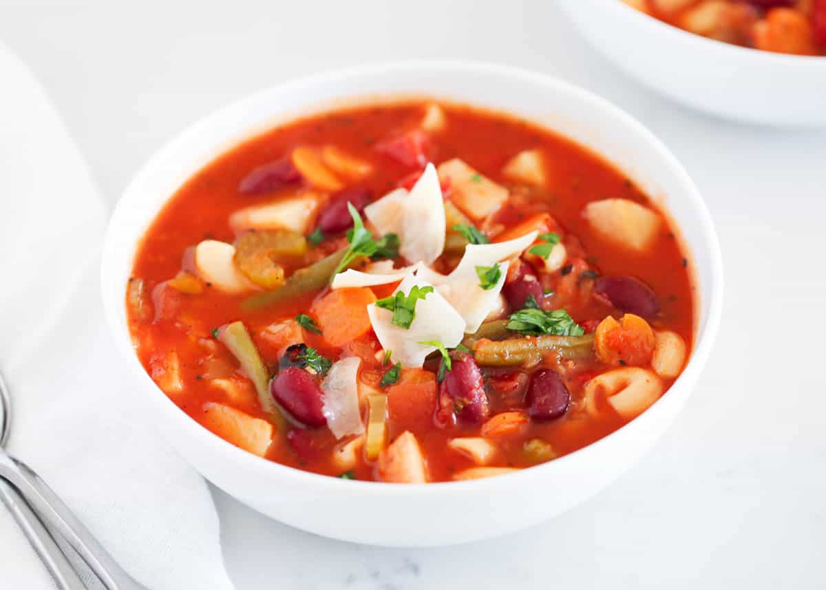 white bowl with minestrone soup