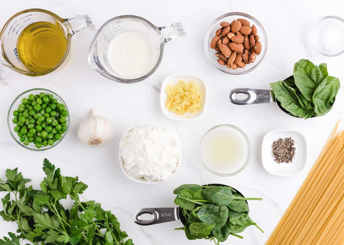 spaghetti pesto ingredients on counter