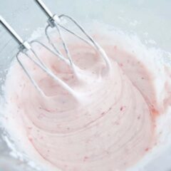 Strawberry cream cheese frosting in a mixing bowl.