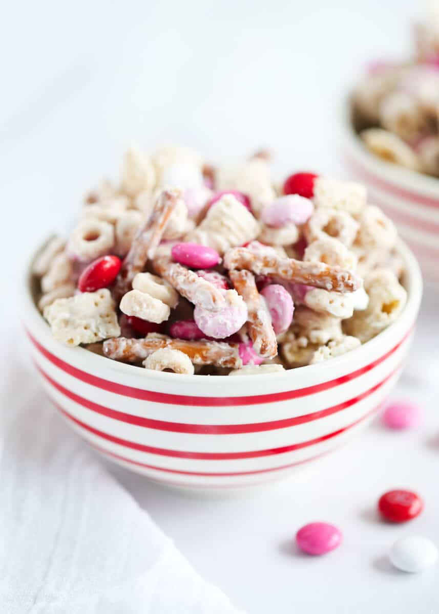valentine chex mix in red striped bowl