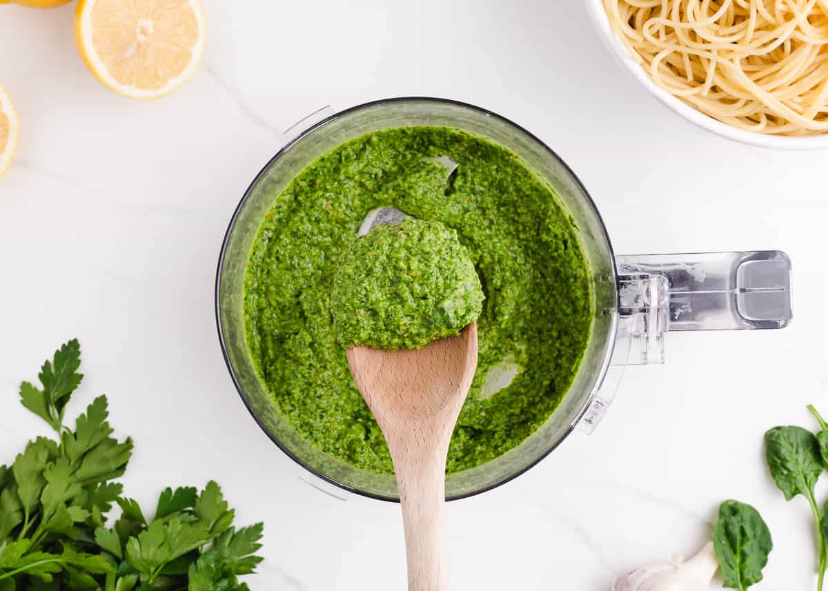 spoonful of pesto from food processor