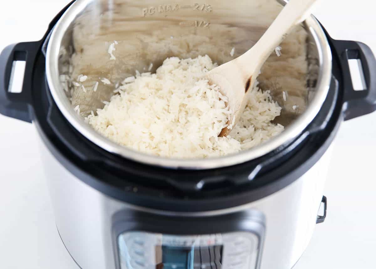 instant pot with rice and spoon