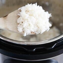 Wooden spoon with rice