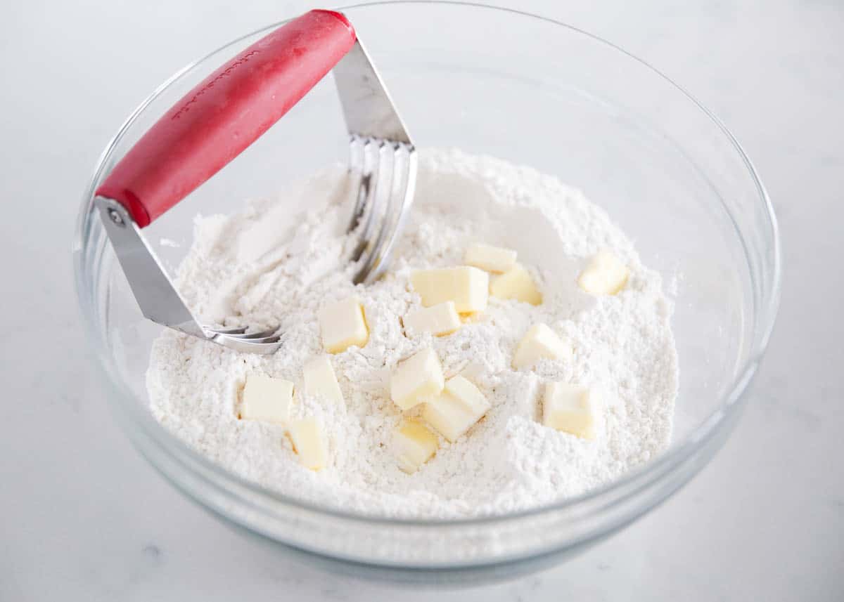 cutting butter into flour with pastry cutter