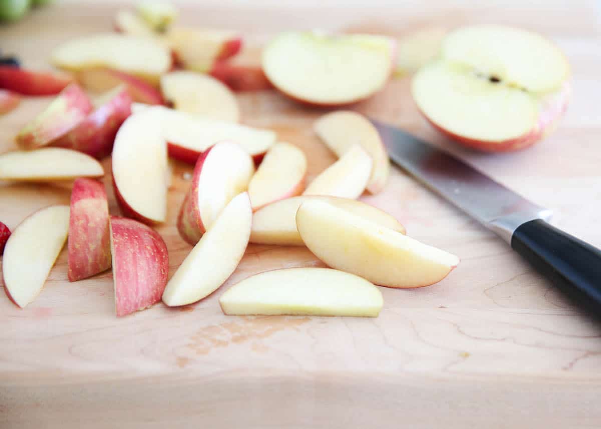 sliced apples on cutting board