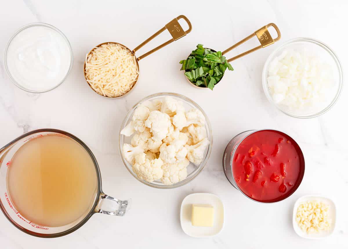 cauliflower tomato soup ingredients on counter