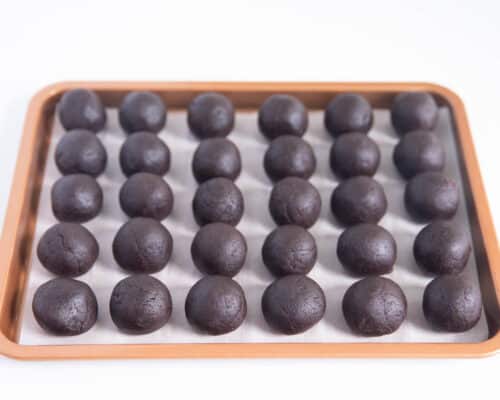 chocolate cake balls on pan