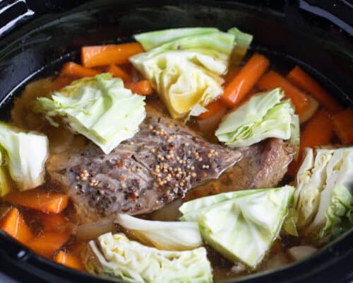corned beef and cabbage cooking in slow cooker