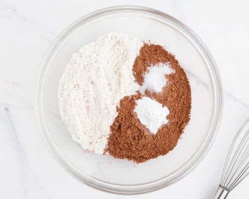 flour and cocoa powder in glass bowl