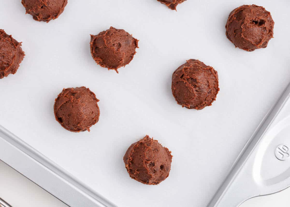 chocolate cookie dough balls on pan