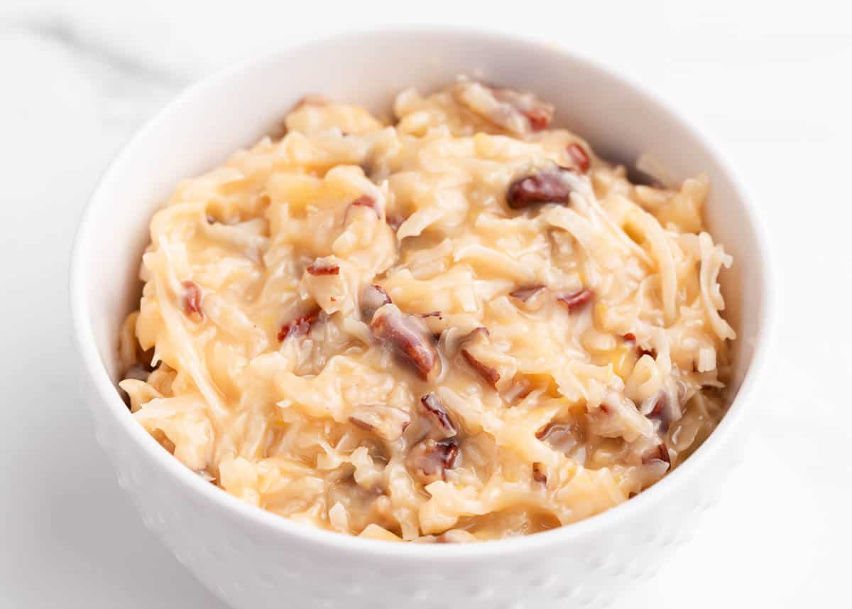 coconut frosting in white bowl