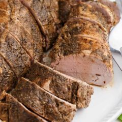 Sliced pork tenderloin on plate