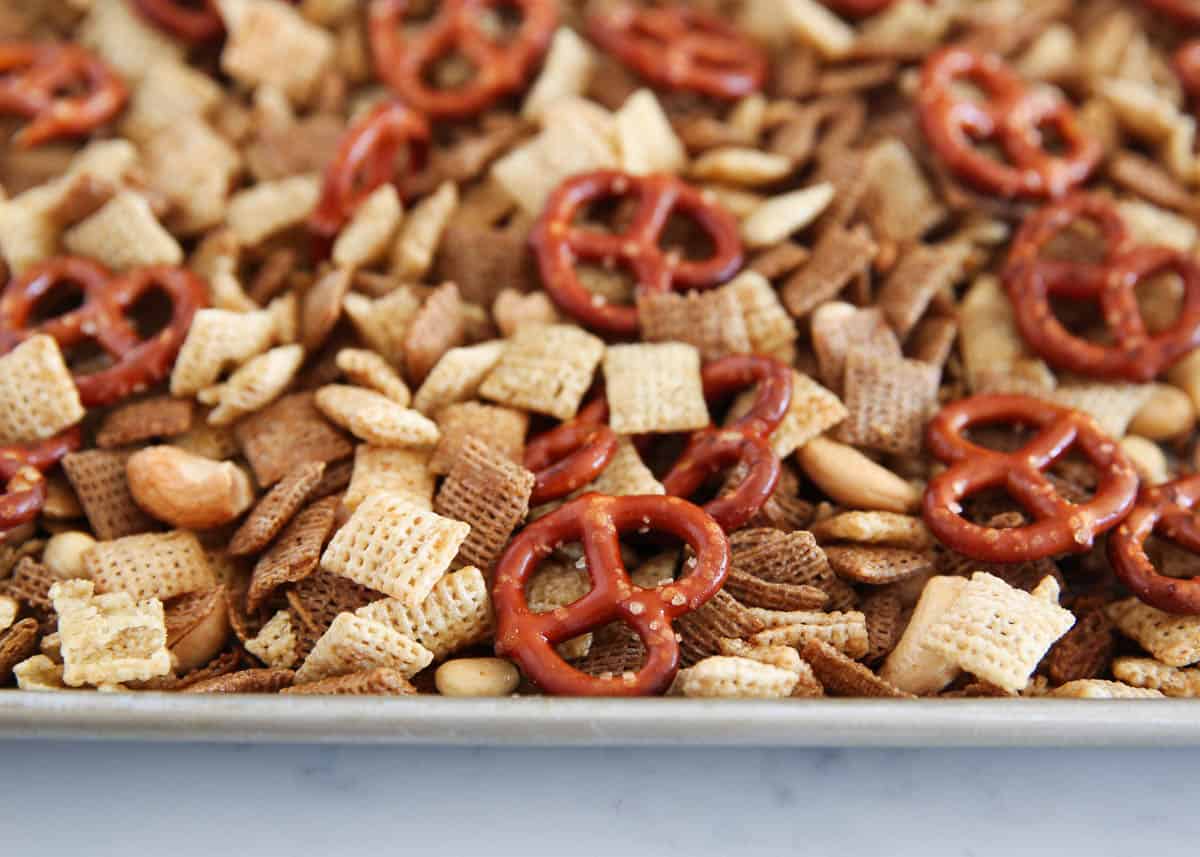 chex mix on a baking sheet