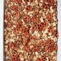 chex mix on a baking sheet