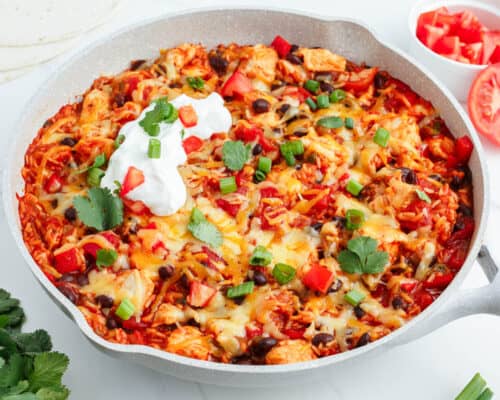 skillet full of mexican chicken and rice