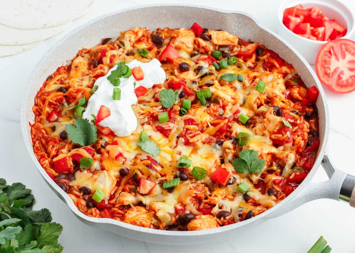 skillet full of mexican chicken and rice