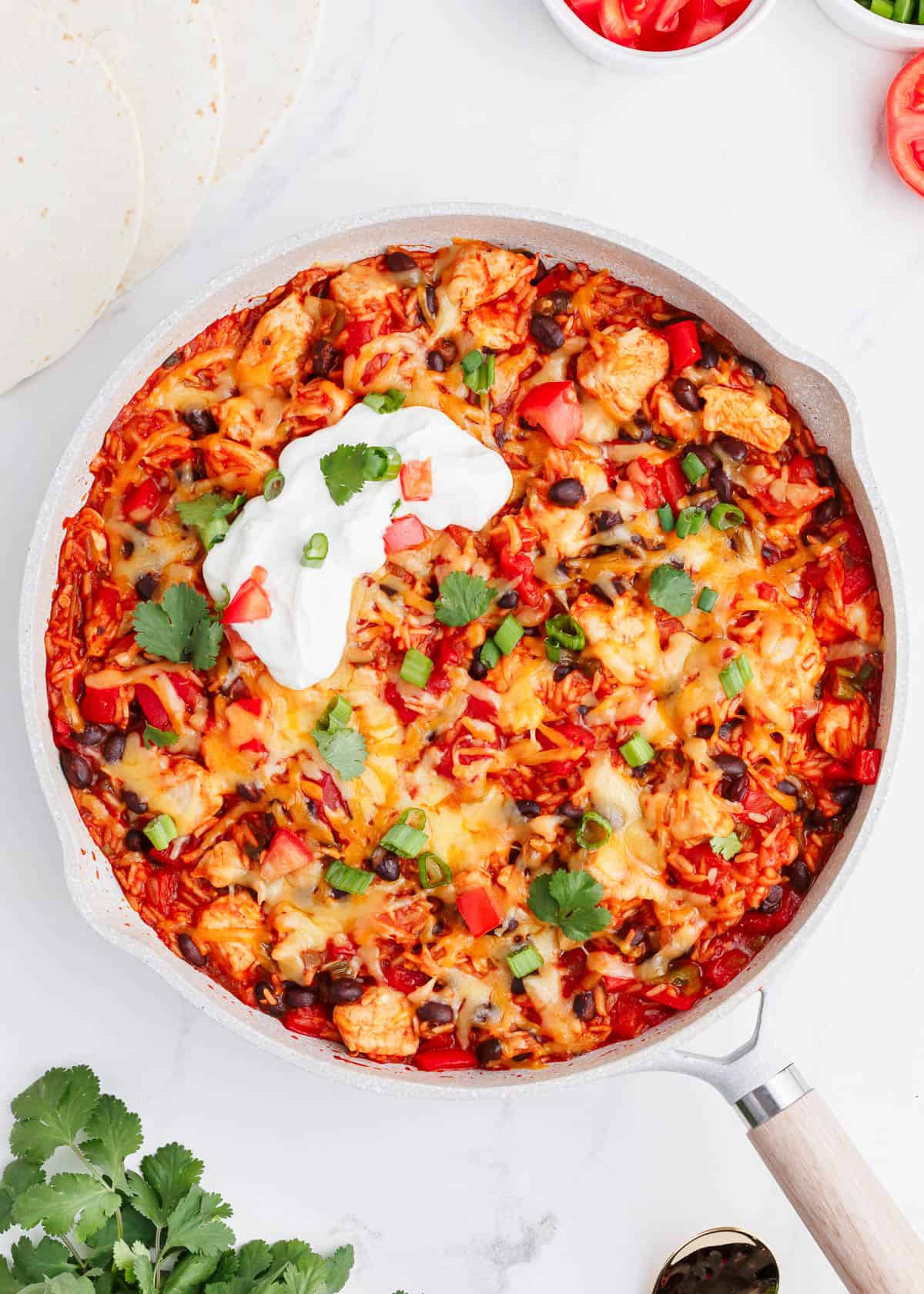 skillet full of mexican chicken and rice