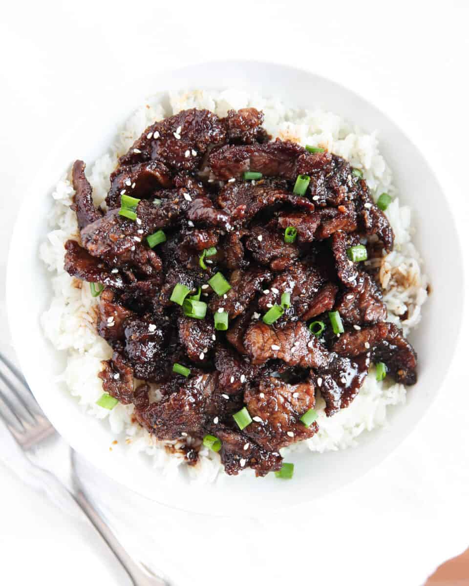 mongolian beef and rice in bowl