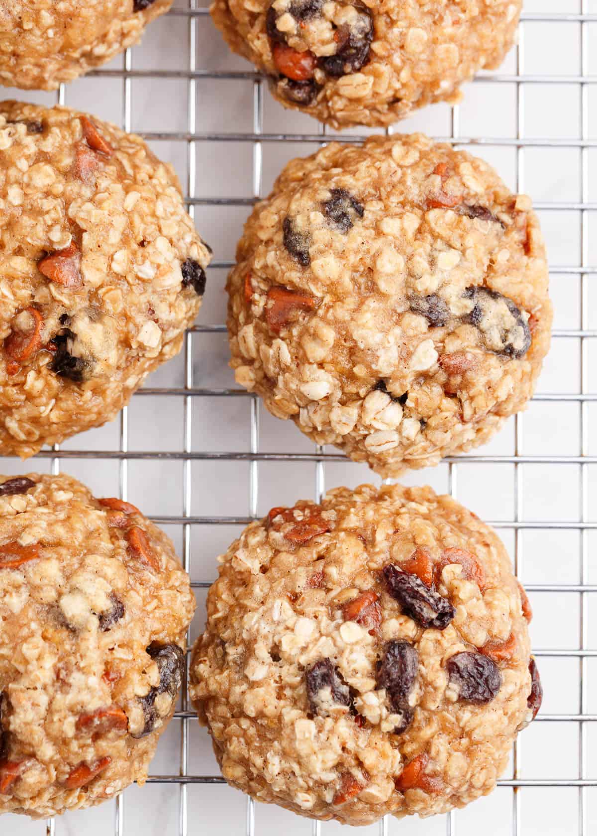 oatmeal raisin cookies with cinnamon chips on cooling rack