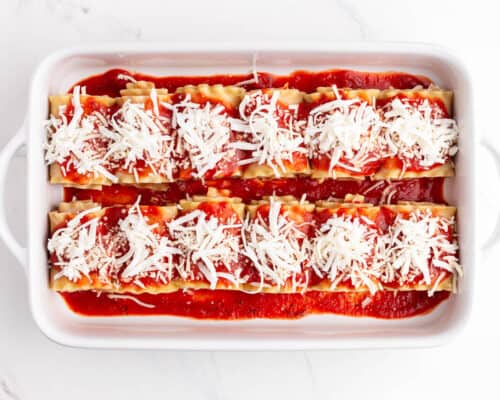 pepperoni lasagna roll up ready to bake in pan